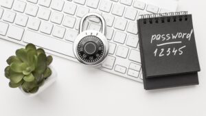 Why You Should Use a Password Manager in 2025 | Safivity Top View Lock Keyboard With Plant Notebook 300x169